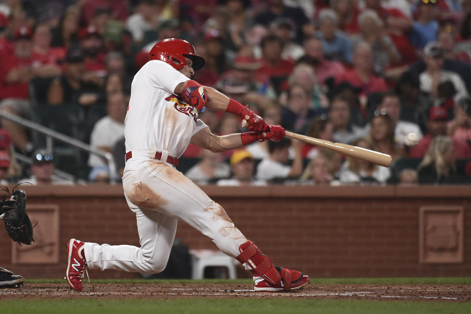 St. Louis Cardinals' Tommy Edman hits a three-run double during the sixth inning of the team's baseball game against the Minnesota Twins on Friday, July 30, 2021, in St. Louis. (AP Photo/Joe Puetz)