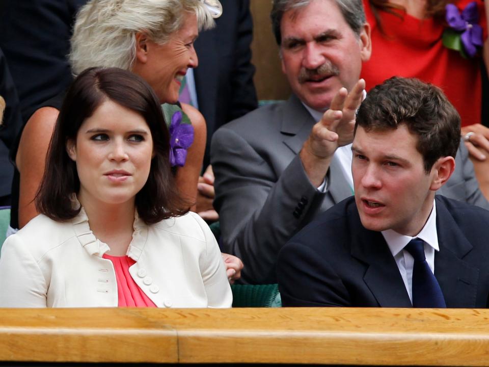 Princess Eugenie and Jack Brooksbank watch Wimbledon from the royal box in 2014.