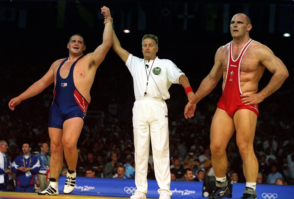 American wrestler Rulon Gardner made his Olympic debut at the 2000 Games in Sydney. The Yankee brute was up against Aleksandr Karelin of Russia, but this was no ordinary match. Until then, Karelin went undefeated for 13 years of international competition and his large build was meant to intimidate his opponents. All that changed when Gardner upset the Russian wrestler to bring the gold back to the U.S. (Getty Images)