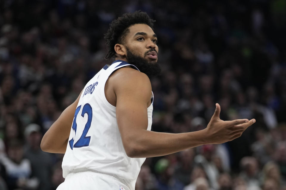 Minnesota Timberwolves center Karl-Anthony Towns looks toward a referee during the first half of an NBA basketball game against the Boston Celtics, Monday, Nov. 6, 2023, in Minneapolis. (AP Photo/Abbie Parr)