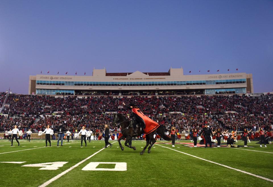 The Masked Rider runs on to the field before the game against Kansas in a Big 12 football game, Saturday, Nov. 12, 2022, at Jones AT&T Stadium. 
