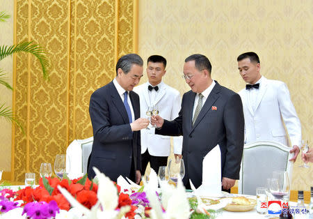 China's state councillor Wang Yi attends a meeting with North Korea's Foreign Minister Ri Yong Ho in Pyongyang in this photo released by North Korea's Korean Central News Agency (KCNA) in Pyongyang on May 3, 2018. KCNA/via REUTERS