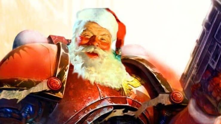  An image of a Warhammer 40k space marine, but with Santa's head. 