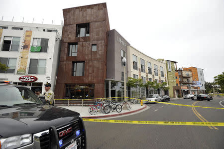 Police tape is seen after a drive-by shooter went on a night time rampage near a Santa Barbara university campus that left six people dead, including the attacker, and seven others wounded, authorities said Saturday, in Isla Vista, California May 24, 2014. REUTERS/Phil Klein