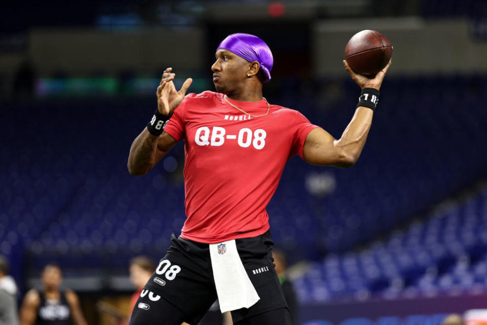 Michael Penix of Washington participates in a drill during the NFL Combine at the Lucas Oil Stadium on March 2, 2024 in Indianapolis, Indiana. / Credit: Kevin Sabitus / Getty Images