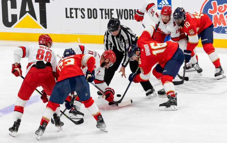 Florida Panthers center Aleksander Barkov (16) and Carolina Hurricanes center Jordan Staal (11) face off in the third period of Game 4 of the NHL Stanley Cup Eastern Conference finals series at the FLA Live Arena on Wednesday, May 24, 2023 in Sunrise, Fla.