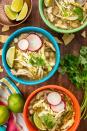 <p>There are three main types of pozole: white (<em>blanco</em>), green (<em>verde</em>), and red (<em>rojo</em>)—yep, just like the <a href="https://www.delish.com/cooking/g1393/traditional-mexican-food-0710/" rel="nofollow noopener" target="_blank" data-ylk="slk:Mexican;elm:context_link;itc:0;sec:content-canvas" class="link ">Mexican</a> flag! Each requires a certain set of ingredients, but hominy and some sort of stewed meat are almost always present. Make no mistake: This <a href="https://www.delish.com/cooking/recipe-ideas/g3849/best-slow-cooker-recipes/" rel="nofollow noopener" target="_blank" data-ylk="slk:slow cooker;elm:context_link;itc:0;sec:content-canvas" class="link ">slow cooker </a>version isn't wholly authentic, but it's easy, flavorful, and filling.</p><p>Get the <strong><a href="https://www.delish.com/cooking/recipe-ideas/recipes/a55758/crock-pot-mexican-posole-recipe/" rel="nofollow noopener" target="_blank" data-ylk="slk:Slow-Cooker Chicken Pozole recipe;elm:context_link;itc:0;sec:content-canvas" class="link ">Slow-Cooker Chicken Pozole recipe</a></strong>.</p>