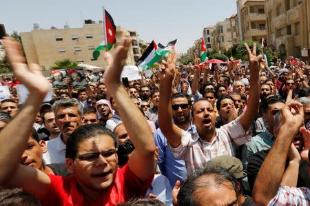 Protestors chanting slogans during a demonstration near the Israeli embassy in Amman, Jordan July 28, 2017. REUTERS/Muhammad Hamed