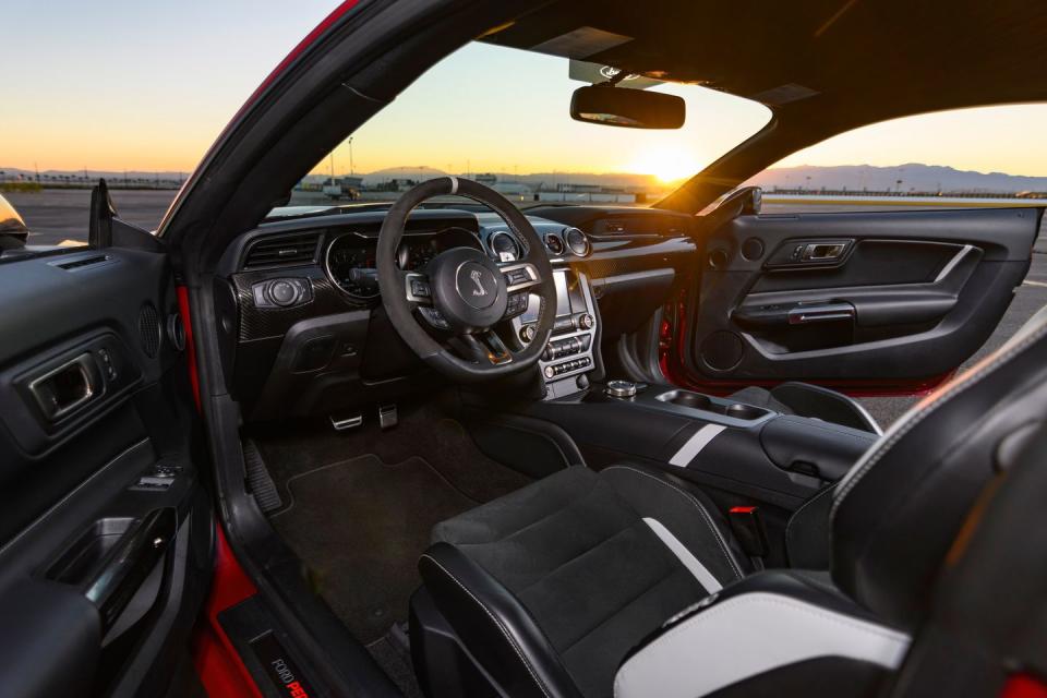 <p>The GT500's seven-speed dual-clutch automatic transmission is controlled by a rotary knob and paddle shifters mounted to the steering wheel. Discerning drivers who insist on a manual transmission will have to make do with its less-powerful stablemate, the 526-hp Shelby GT350.</p>