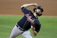 Atlanta Braves starting pitcher Ian Anderson delivers against the Los Angeles Dodgers during the first inning in Game 7 Sunday, Oct. 18, 2020, in the best-of-seven National League Championship Series in Arlington, Texas. (Curtis Compton/Atlanta Journal-Constitution via AP)