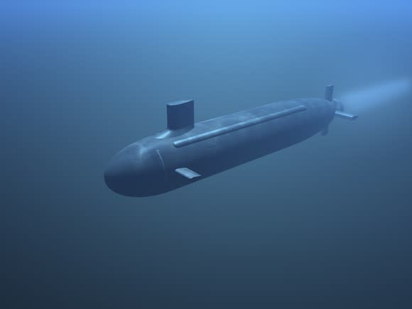 A submarine in motion under water.