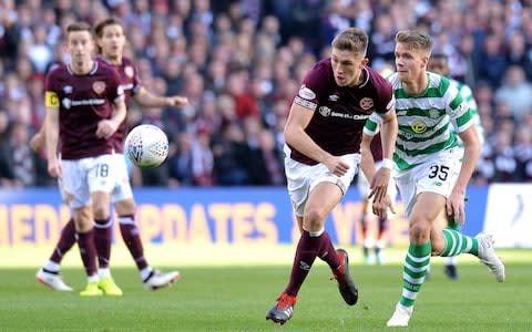 Jimmy Dunne of Heart of Midlothian F.C. runs onto the ball during the Betfred Scottish League Cup Semi Final  - Credit: GETTY IMAGES