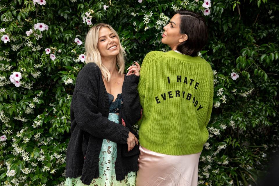 "Vanderpump Rules" stars Ariana Madix and Katie Maloney, who's wearing a cardigan that says "I Hate Everybody"