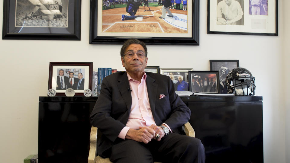 Dennis Gilbert sitting in his The Gilbert Group insurance office in Beverly Hills, California.