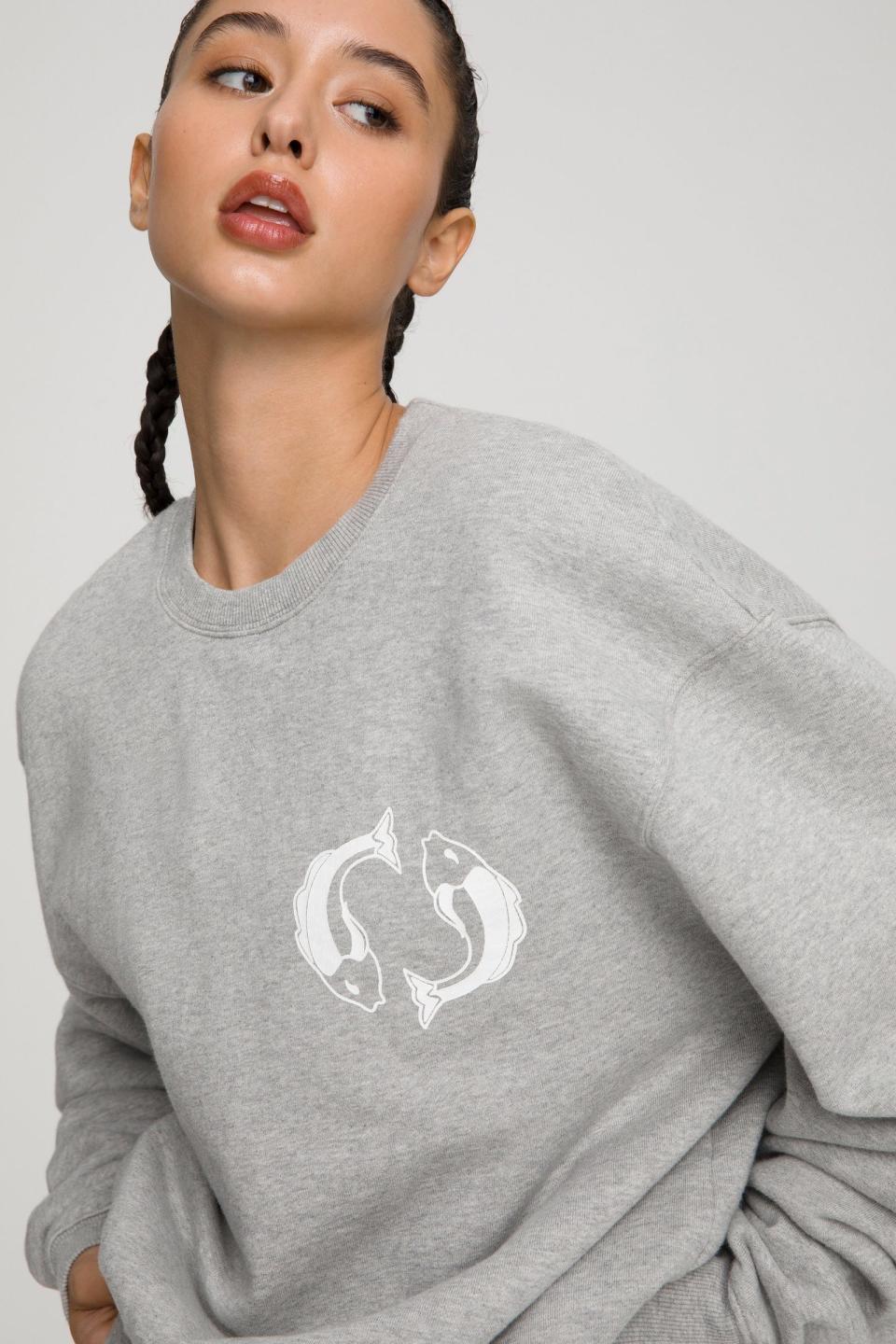 The Pisces Zodiac Sweat Set from Good American. Sweatshirt, $124 and sweatpants $105. 