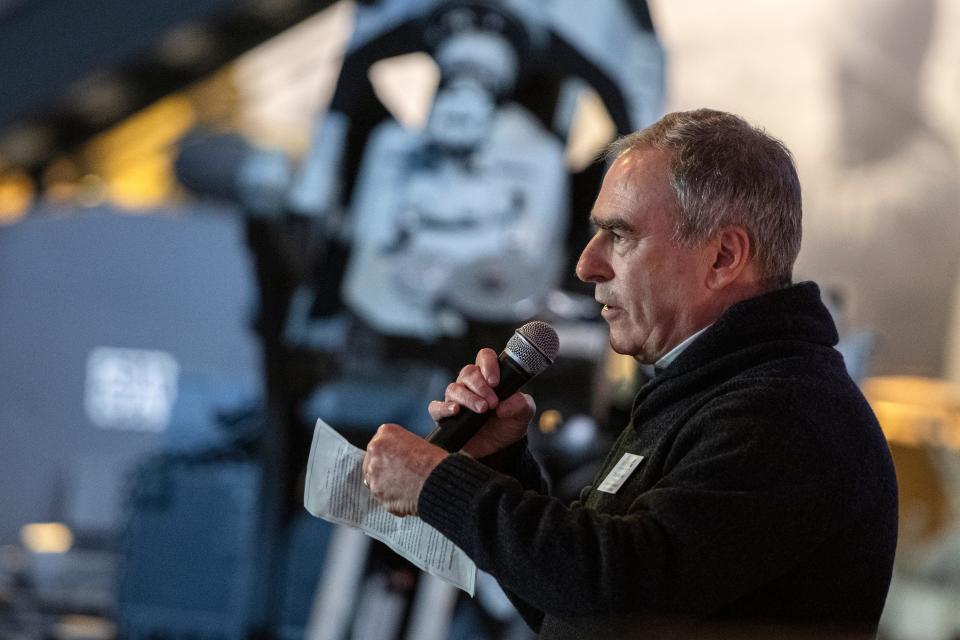 Christopher Mauriello, director of the Center for Holocaust and Genocide Studies at Salem State University, speaks during the induction ceremony for the World War II-era German rail car, part of the Holocaust exhibit at the American Heritage Museum in Hudson, Jan. 19, 2024.