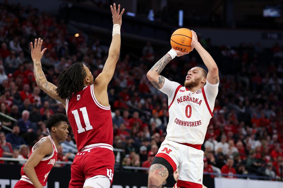 Mar 15, 2024; Minneapolis, MN, USA; Nebraska Cornhuskers guard C.J. Wilcher (0) shoots as Indiana Hoosiers guard CJ Gunn (11) defends during the first half at Target Center. Mandatory Credit: Matt Krohn-USA TODAY Sports