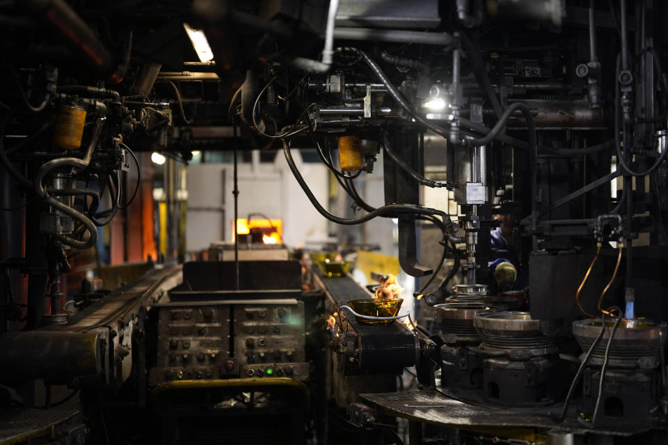 A bowl is manufactured in the factory of the French glassmaker Duralex, in La Chapelle Saint-Mesmin, central France, Wednesday, Sept. 7, 2022. Iconic French tableware brand Duralex is joining a growing array of European firms that are reducing and halting production because of soaring energy costs. (AP Photo/Thibault Camus)