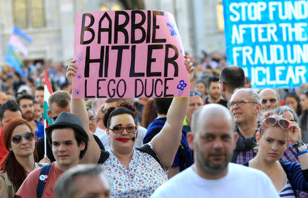 People attend a protest against the government of Prime Minister Viktor Orban in Budapest, Hungary, April 21, 2018. REUTERS/Bernadett Szabo