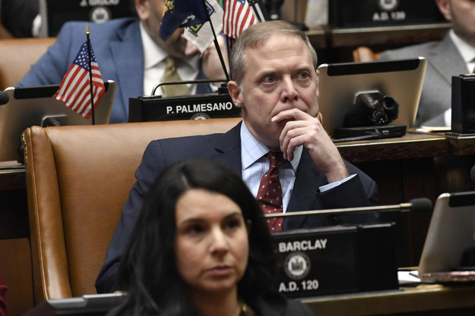 FILE - New York Assembly Minority Leader Will Barclay, R-Fulton, listens while in the Assembly Chamber on the opening day of the legislative session at the state Capitol in Albany, N.Y., Jan. 8, 2020. (AP Photo/Hans Pennink, File)