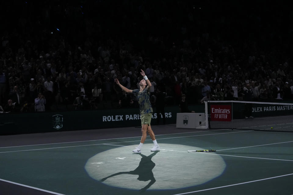 Denmark's Holger Rune celebrates as he defeats Serbia's Novak Djokovic during their Paris Masters final at the Accor Arena, Sunday, Nov. 6, 2022 in Paris. Rune won 3-6, 6-3, 7-5. (AP Photo/Thibault Camus)