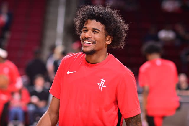<p>Logan Riely/NBAE via Getty</p> Jalen Green warming up before a basketball game in March 2024