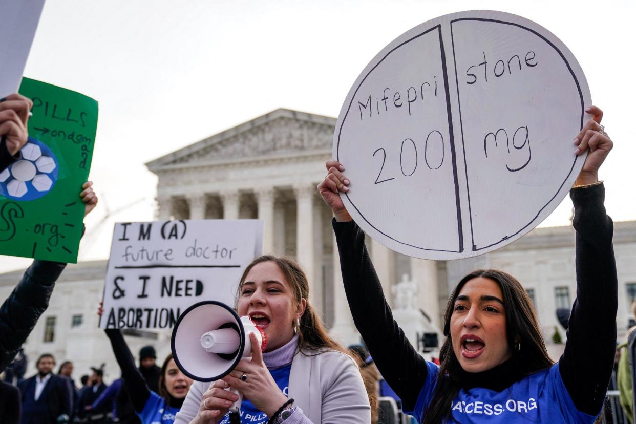 <span>Abortion rights activist rally in front of the US supreme court on Tuesday.</span><span>Photograph: Drew Angerer/AFP/Getty Images</span>