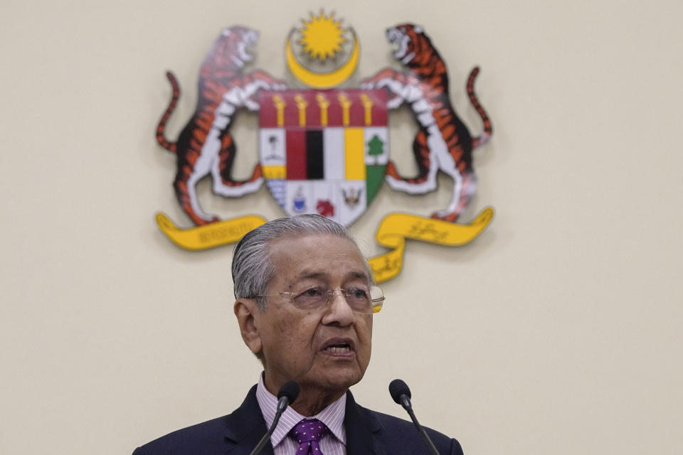 Malaysian interim leader Mahathir Mohamad speaks during a press conference at his office in Putrajaya, Malaysia, Thursday, Feb. 27, 2020. Mahathir says Parliament will pick a new prime minister after the king failed to establish who has majority support following the collapse of the ruling coalition. (AP Photo/Vincent Thian)