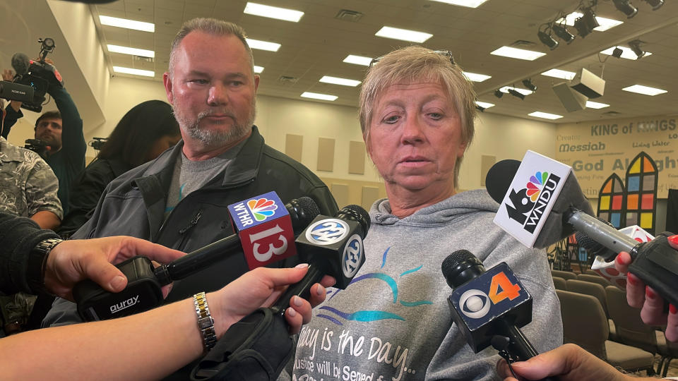 Grandparents of Liberty German — Mike Patty, left, and Becky Patty, right — speak with reporters after a news conference Oct. 31, 2022, in Delphi, Ind. Indiana authorities that day announced the arrest of a man in the unsolved slayings of German and her friend Abigail Williams, who were killed while hiking five years ago near their small community in northern Indiana. (Arleigh Rodgers/Report for America via AP)