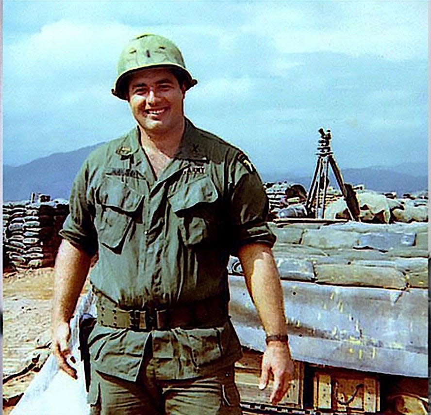 On July 21, 1970, Bob Kalsu was killed by a mortar round. He died only hours before his wife gave birth to their son back home. This photo shows Kalsu during a quiet moment at the firebase.