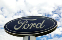 FILE PHOTO - The sign at a Ford dealer is pictured in Lakewood, Colorado, U.S., on September 4, 2013. REUTERS/Rick Wilking/File Photo