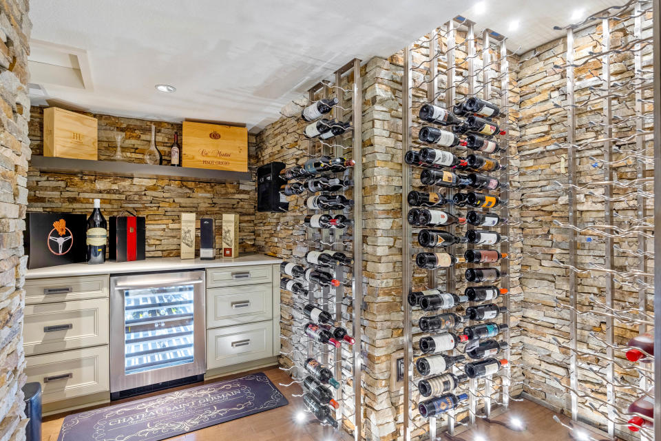 The house includes a temperature-controlled wine cellar.
