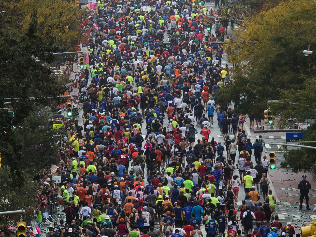Runners move along First Avenue during the New York City Marathon: Andres Kudacki/AP