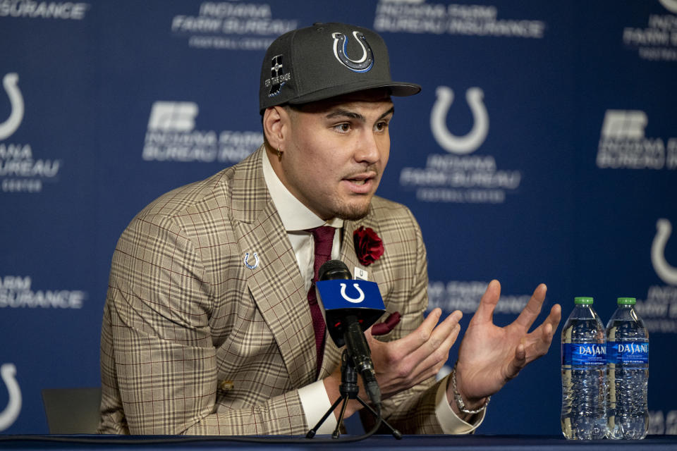 Indianapolis Colts first round draft pick Laiatu Latu speaks at an NFL football press conference in Indianapolis, Friday, April 26, 2024. (AP Photo/Doug McSchooler)