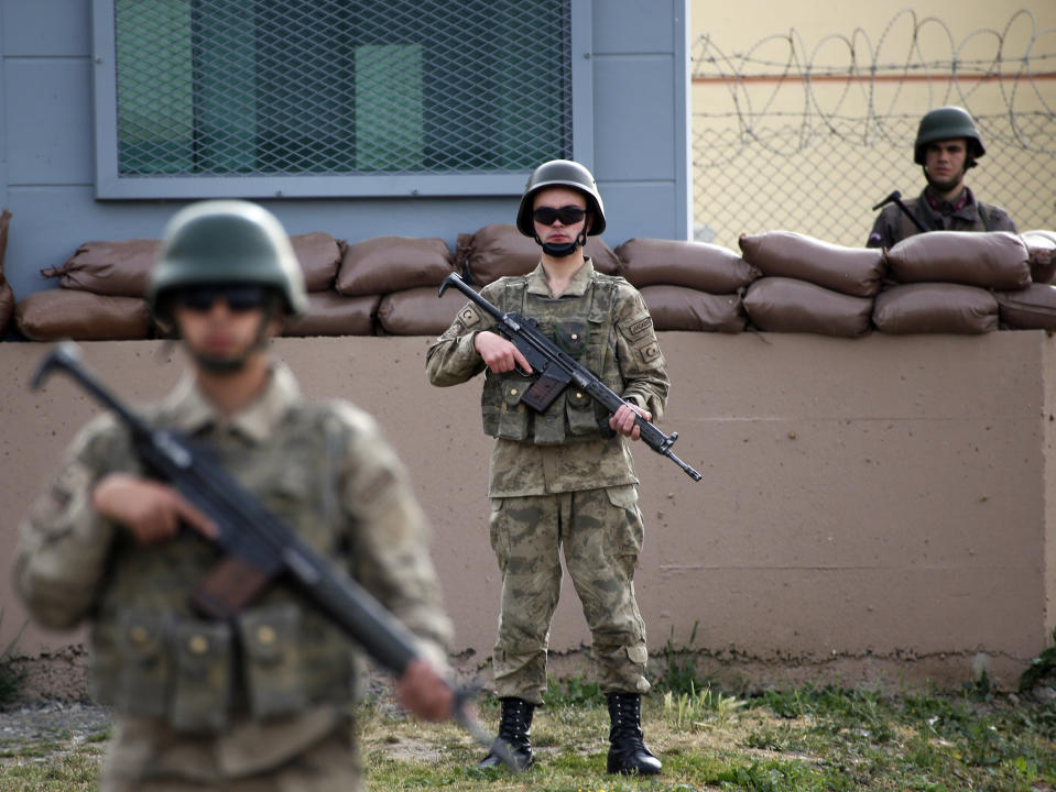FILE - In this Monday, April 16, 2018 file photo, members of Turkish forces guard the prison complex in Aliaga, Izmir province, western Turkey, where jailed U.S. evangelical pastor Andrew Craig Brunson was appearing on his trial at a court inside the complex. Turkey's arrests of Brunson and other Western citizens have thrust its troubled judicial system to the forefront of ties with allies, reinforcing suspicions that the Turkish government is using detainees as diplomatic leverage. (AP Photo/Lefteris Pitarakis, File)