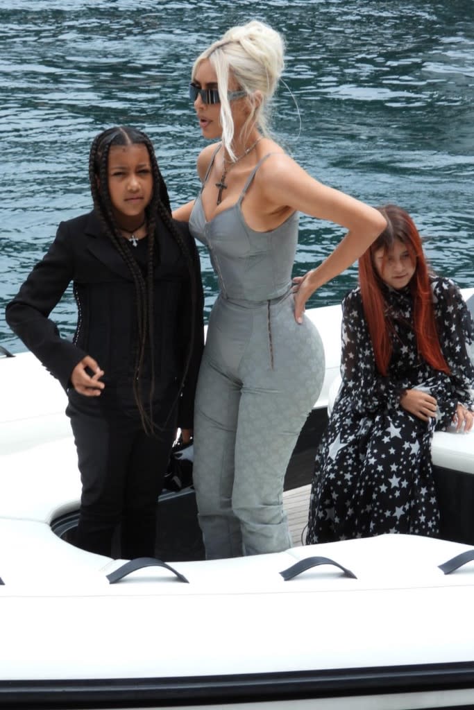 Kim Kardashian and North West travel to Kourtney Kardashian and Travis Barker’s wedding in Portofino, Italy on May 22, 2022. - Credit: Oliver Palombi / MEGA TheMegaAgency.com