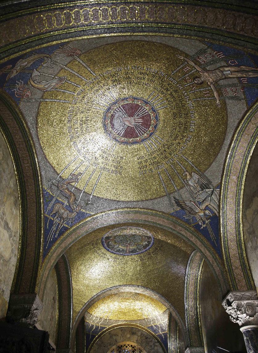 This Thursday, March 20, 2014 photo shows the glass mosaic decorated domes by Hildreth Meiere in St. Bartholomew's Church in New York. While Meiere's name has been largely forgotten her works abound throughout the country. “The Art Deco Murals of Hildreth Meiere," by Catherine Coleman Brawer and Kathleen Murphy Skolnik with photographs by Meiere’s granddaughter, Hildreth Meiere Dunn, is set for release May 1. (AP Photo/Seth Wenig)