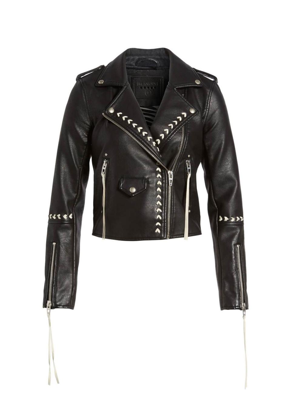 "Leather jackets are a staple, but this one offers a fun twist on a classic style—I can get a head start on the Western trend for fall." —AC