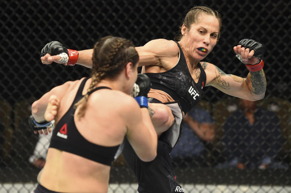 BOISE, ID - JULY 14:  (R-L) Liz Carmouche kicks Jennifer Maia of Brazil in their women's flyweight fight during the UFC Fight Night event inside CenturyLink Arena on July 14, 2018 in Boise, Idaho. (Photo by Josh Hedges/Zuffa LLC/Zuffa LLC via Getty Images)