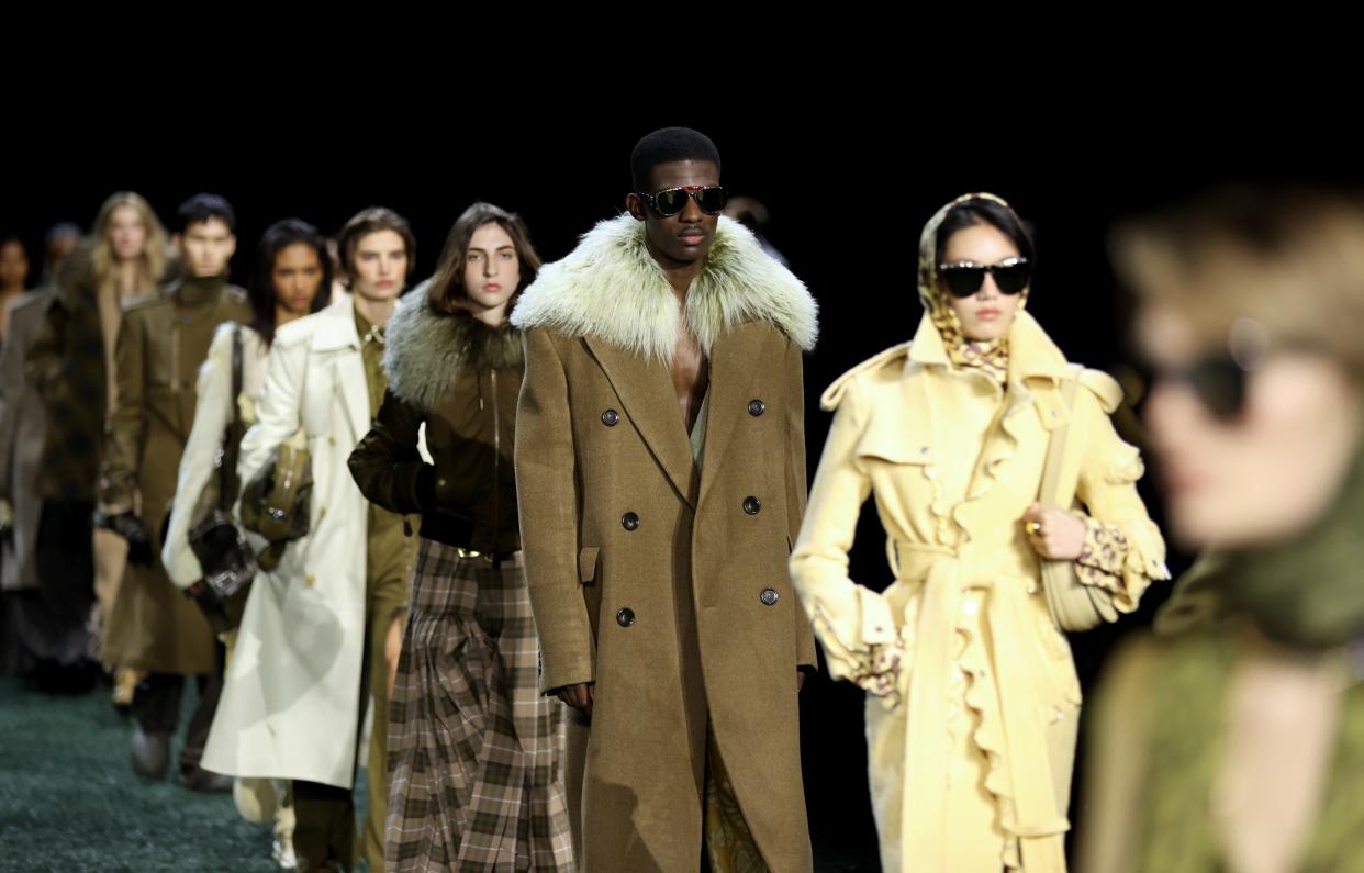 Models present creations at the Burberry catwalk show during London Fashion Week in London, Britain, Feb. 19, 2024. (Photo by Li Ying/Xinhua via Getty Images)