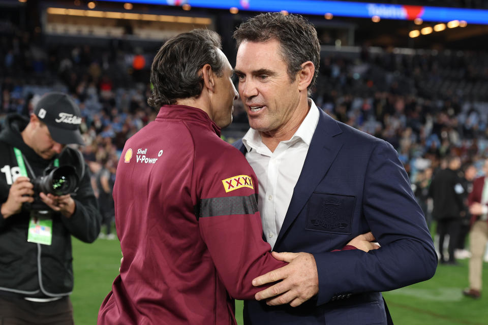 SYDNEY, AUSTRALIA - JULY 12: Maroons coach Billy Slater and Blues coach Brad Fittler embrace after game three of the State of Origin series between New South Wales Blues and Queensland Maroons at Accor Stadium on July 12, 2023 in Sydney, Australia. (Photo by Mark Kolbe/Getty Images)