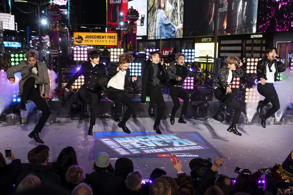 FILE - Korean pop band BTS performs at the Times Square New Year's Eve celebration in New York on Dec. 31, 2019. “Dynamite,” the group’s first all-English song, debuted at No. 1 on the U.S. music charts this week, making BTS first Korean pop act to top the chart. (Photo by Ben Hider/Invision/AP, File)