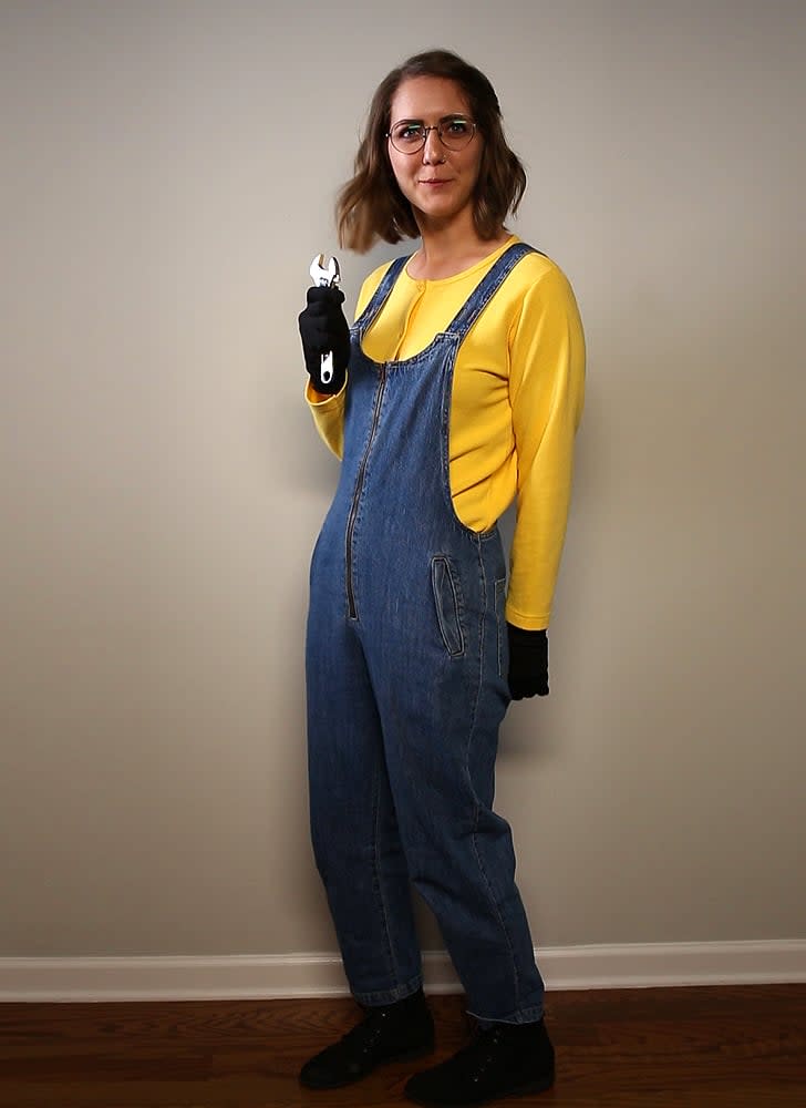 A person is dressed as a Minion.