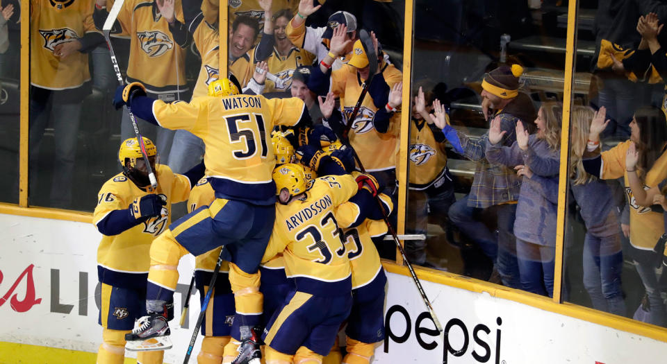 Kevin Fiala is buried, somewhere under there.(Getty)