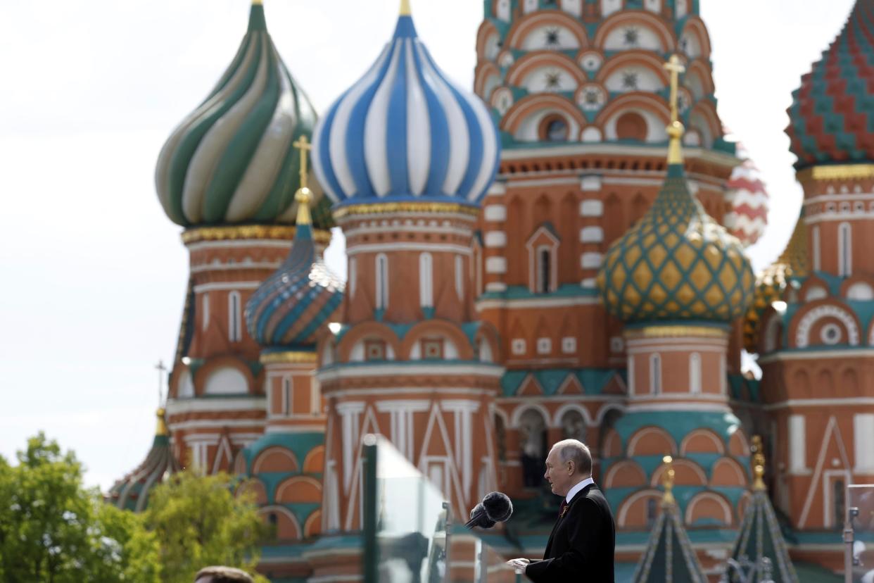 Putin delivers his Victory Day speech, with St Basil’s Cathedral in the background (AP)