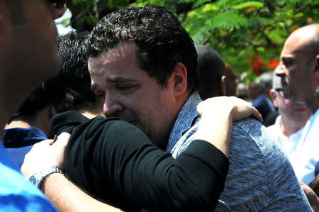 A relative of the victims of the missing EgyptAir flight MS804 reacts after a sympolic funeral in a mosque nearby Cairo airport, in Cairo Egypt May 20, 2016. REUTERS/Stringer