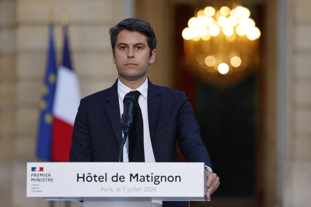 France's Prime Minister Gabriel Attal gives a speech following the first results of the second round of France's legislative election at Matignon in Paris on July 7, 2024. (Photo by Ludovic MARIN / AFP) (Photo by LUDOVIC MARIN/AFP via Getty Images)