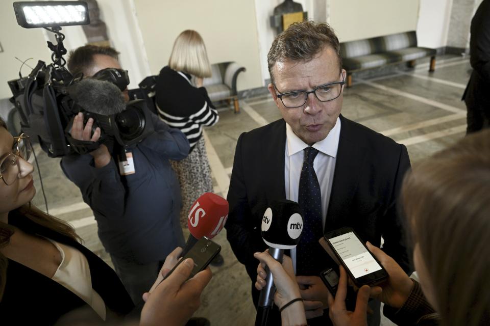 Finnish Prime Minister Petteri Orpo meets the media after his government's non-confidence vote at the Parliament of Finland in Helsinki on Friday, Sept. 8, 2023. (Vesa Moilanen/Lehtikuva via AP)