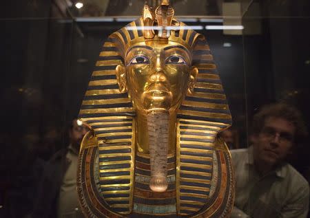 The mask of King Tutankhamun, which was found to have been damaged and glued back together, is seen at the Egyptian Museum in Cairo January 24, 2015. REUTERS/Staff