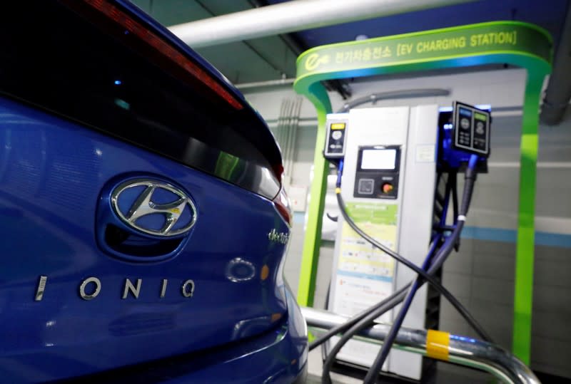 A Hyundai Motor's electric car IONIQ is charged at a electric charging station in Seoul